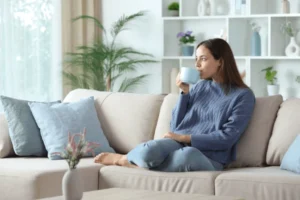 relaxed-woman-blue-drinking-coffee-600nw-2711943481